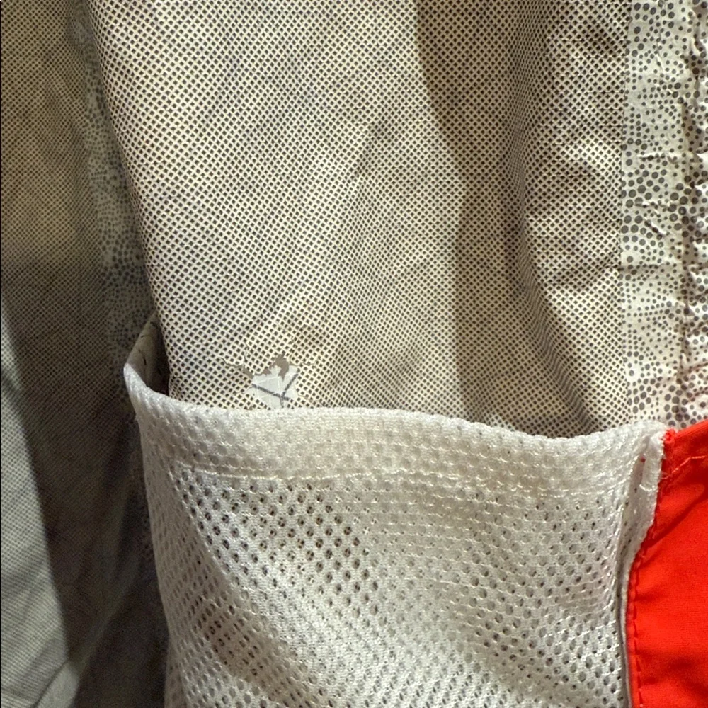 The North Face Women's White Geometric Ski Jacket with Red Zipper